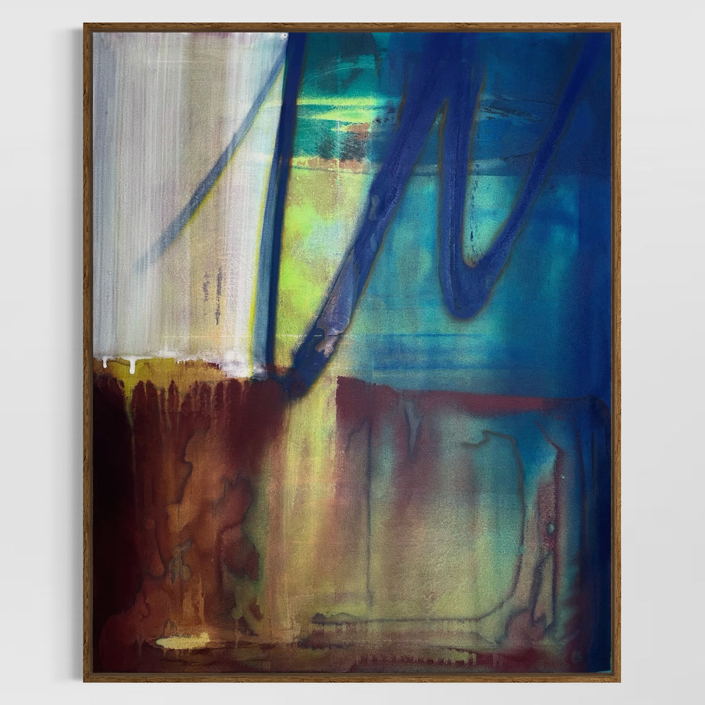 Abstract painting with vibrant colors on a white wall
